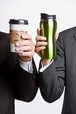 Businessmen holding coffee cups