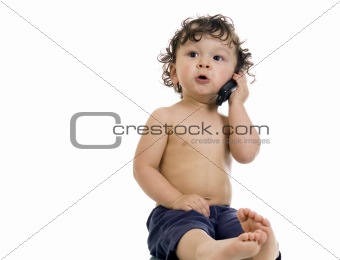Baby with telephone.