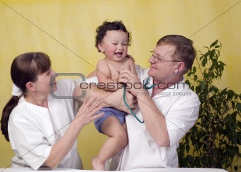 Baby with doctor.