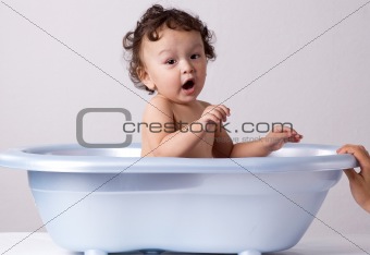 Bathing baby.