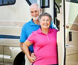 Happy Retired Couple with RV