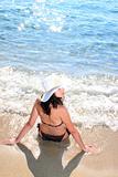 tanned woman in bikini in the sea
