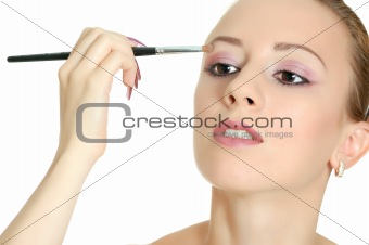 Attractive woman with brush
