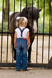 Little girl and pony