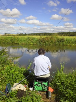 fisherman by a river