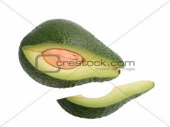 Portion of single green avocado.