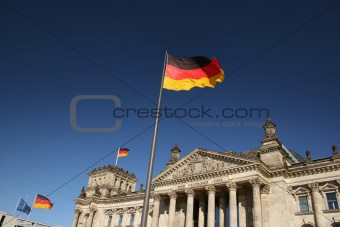 German Parliament Reichstag in Berlin with flaggs
