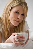 Woman Relaxing With Cup of Coffee