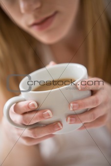 Close-up of Woman Holding Coffee Mug