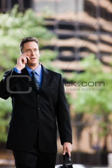 Businessman Outdoors on Cell Phone