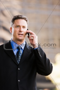Man talking on his phone in a suit