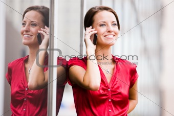 Woman With Cell Phone and Reflection