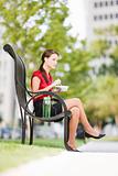 Businesswoman Eating Lunch Outside
