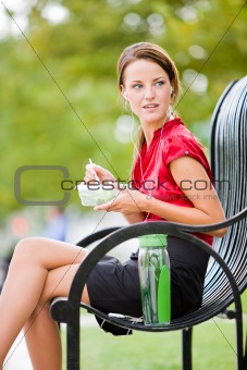 Woman taking her lunch break outside