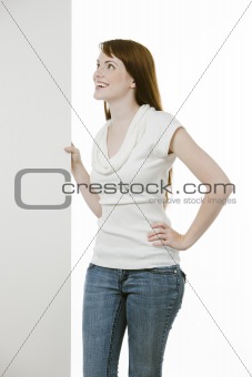Woman holding a blank board