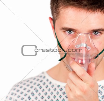 Patient with a mask looking at the camera