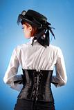 Rear view of beautiful girl in Victorian style clothes 