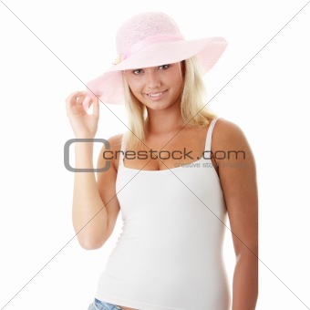 Young woman wearing a pink straw hat