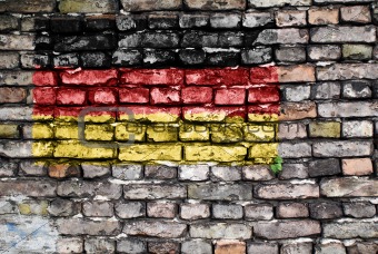 Flag of Germany on an old brick wall