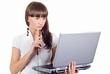 Young businesswoman with phone and laptop over white