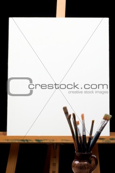 canvas,brushes and easel