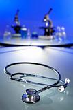 Stethoscope and Microscopes In Medical Research Laboratory