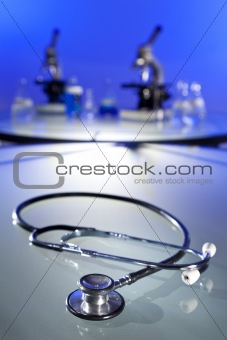 Stethoscope and Microscopes In Medical Research Laboratory