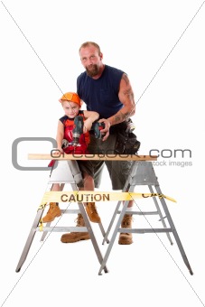 Father teaching son drilling