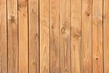 Wall covered with pine wooden boards