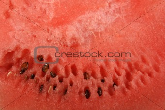 Red background of ripe watermelon.
