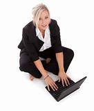 beautiful businesswoman uses her netbook wirelessly