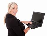 beautiful businesswoman uses laptop and Internet