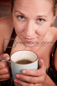 Pretty blonde woman with coffee