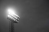 Stadium spotlights lite at night.