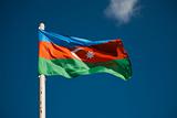 Azerbaijani flag against blue sky