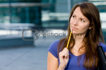 Pretty caucasian girl pondering thinking