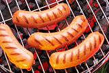 sausages in a grill