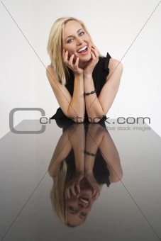 Beautiful Laughing Blond Girl And Her Reflection
