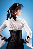 Rear view of attractive girl in Victorian style clothes 