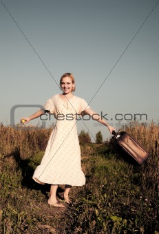 Dancing with suitcase