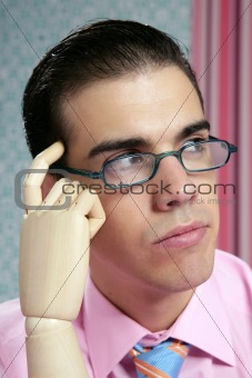 Businessman retro thinking with wooden finger