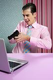 businessman young shooting handgun computer