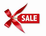 Sales Tag With Big Red Ribbon Bow Tied