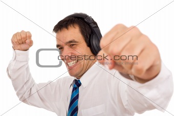 Businessman releasing stress listening to music