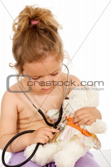 Little girl with small pox playing doctors with her teddy bear