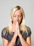 Portrait of a praying woman