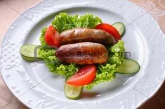 Dish with sausages
