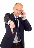 Businessman with bad news on his cell phone