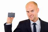 Businessman handing a blank card