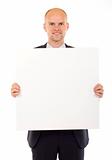 Businessman holding blank board